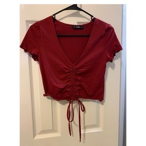 Solid Lettuce Trim Drawstring Front Top